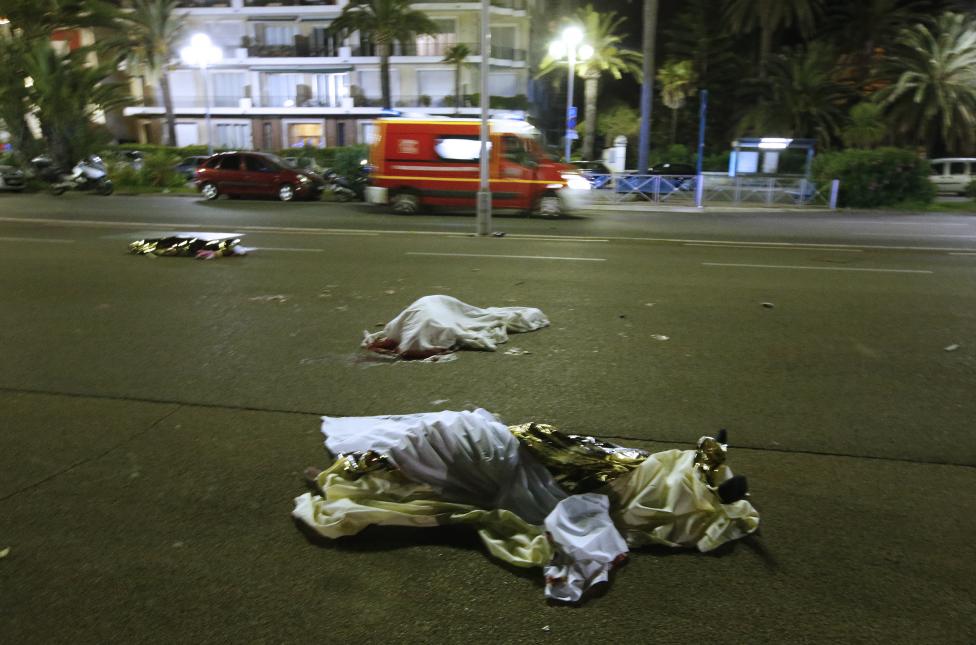 Bodies are seen on the ground after a truck ran into a crowd celebrating the Bastille Day national holiday in Nice, France. REUTERS/Eric Gaillard